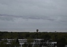 Российский триколор над городом Московским